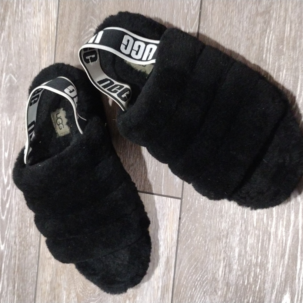 UGG womens iconic black shearling slides. Size 7